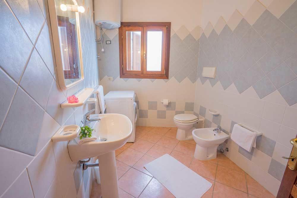 טנאונלה Residence Baia Sant Anna Con Piscina מראה חיצוני תמונה
