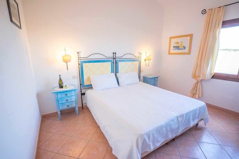 טנאונלה Residence Baia Sant Anna Con Piscina מראה חיצוני תמונה
