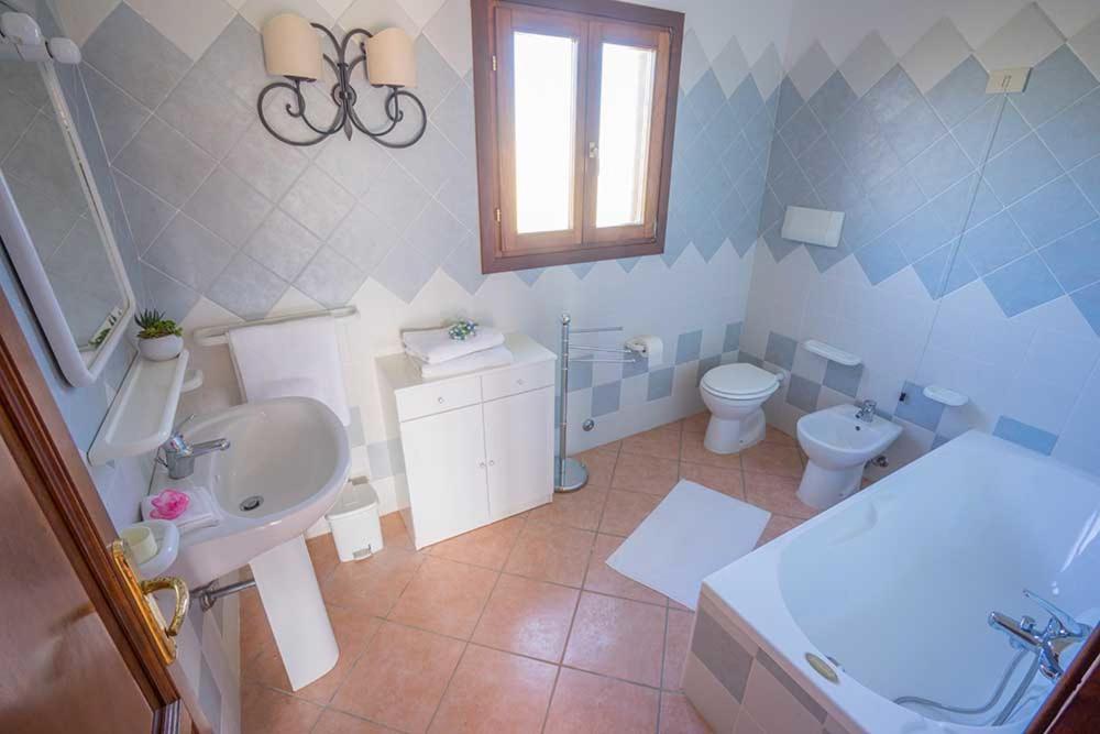 טנאונלה Residence Baia Sant Anna Con Piscina מראה חיצוני תמונה