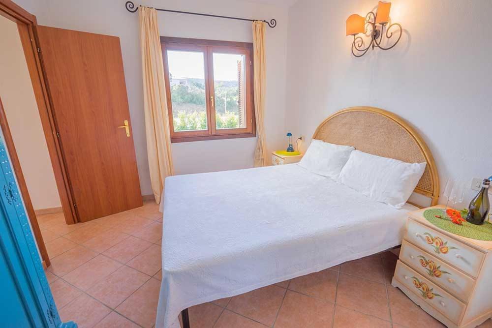 טנאונלה Residence Baia Sant Anna Con Piscina מראה חיצוני תמונה
