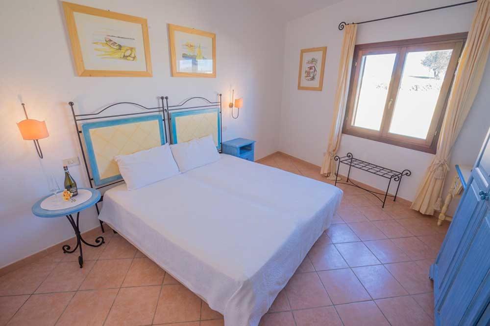 טנאונלה Residence Baia Sant Anna Con Piscina מראה חיצוני תמונה